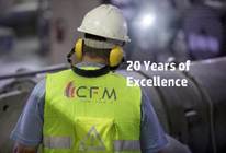 A person wearing a yellow vest and white hardhat

Description automatically generated